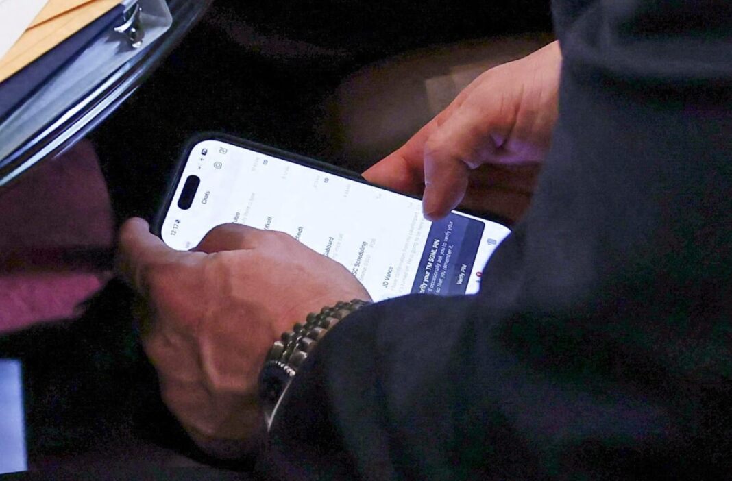 Photo showing Mike Waltz using the TM SGNL app (Image: Reuters)